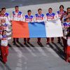 Россия на Олимпиаду не едет. Поедут ли 'нейтральные атлеты' (Российские медалисты выносят российский флаг во время церемонии закрытия XXII зимних Олимпийских игр в Сочи) Российские медалисты…