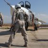 Asharq Al-Awsat: террористы атаковали российскую базу 'Хмеймим' (Российские летчики перед полетом у самолета Су-24 на авиабазе Хмеймим в Сирии | © РИА Новости, Дмитр…) Российские летчики п…
